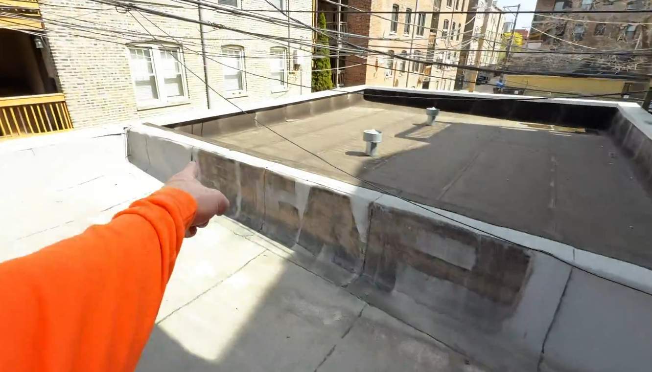 How Can I Stop Rainwater from Seeping Through My Garage Wall?